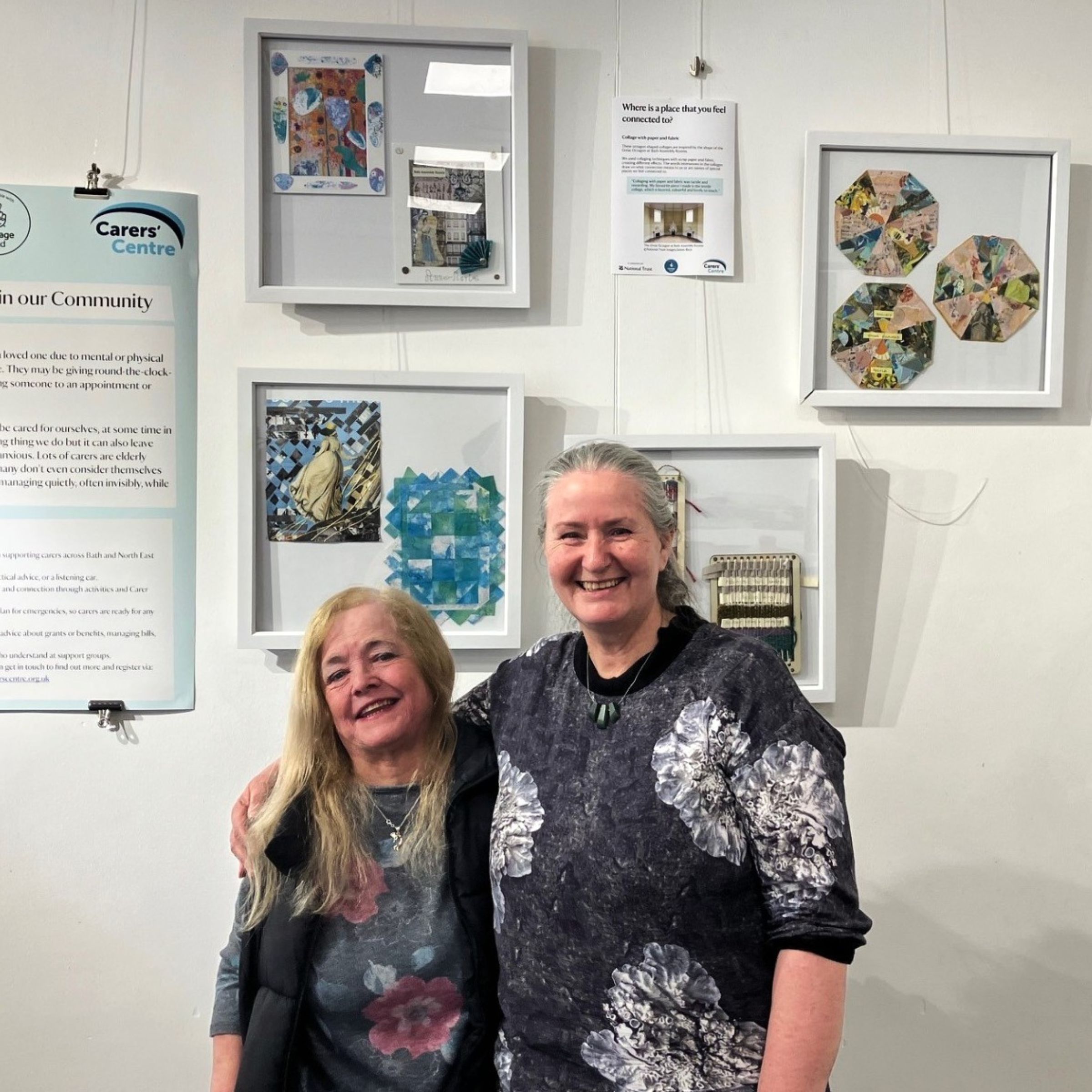 Lynda and Fiona in front of craft exhibits on wall