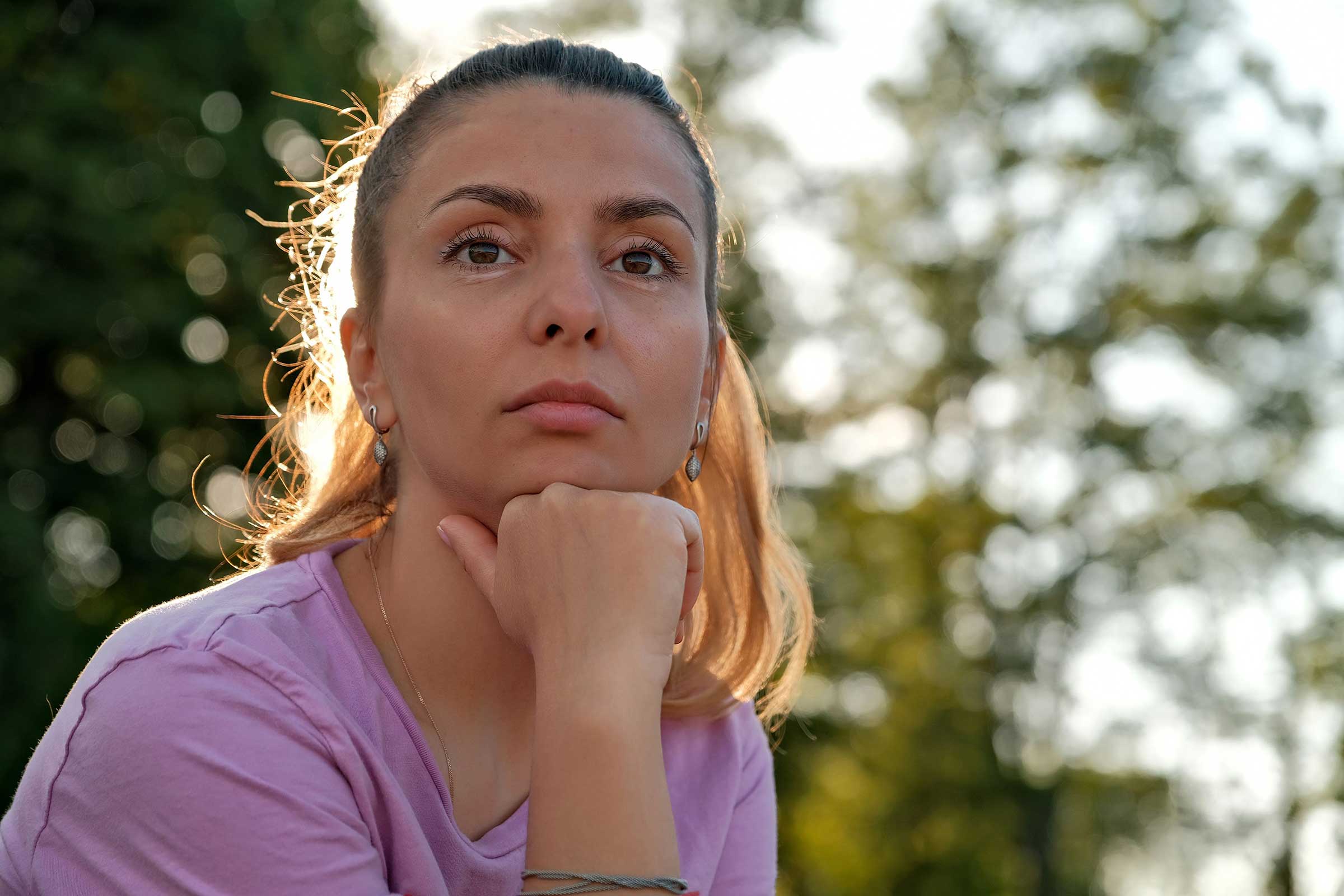 Woman Looking Pass The Camera