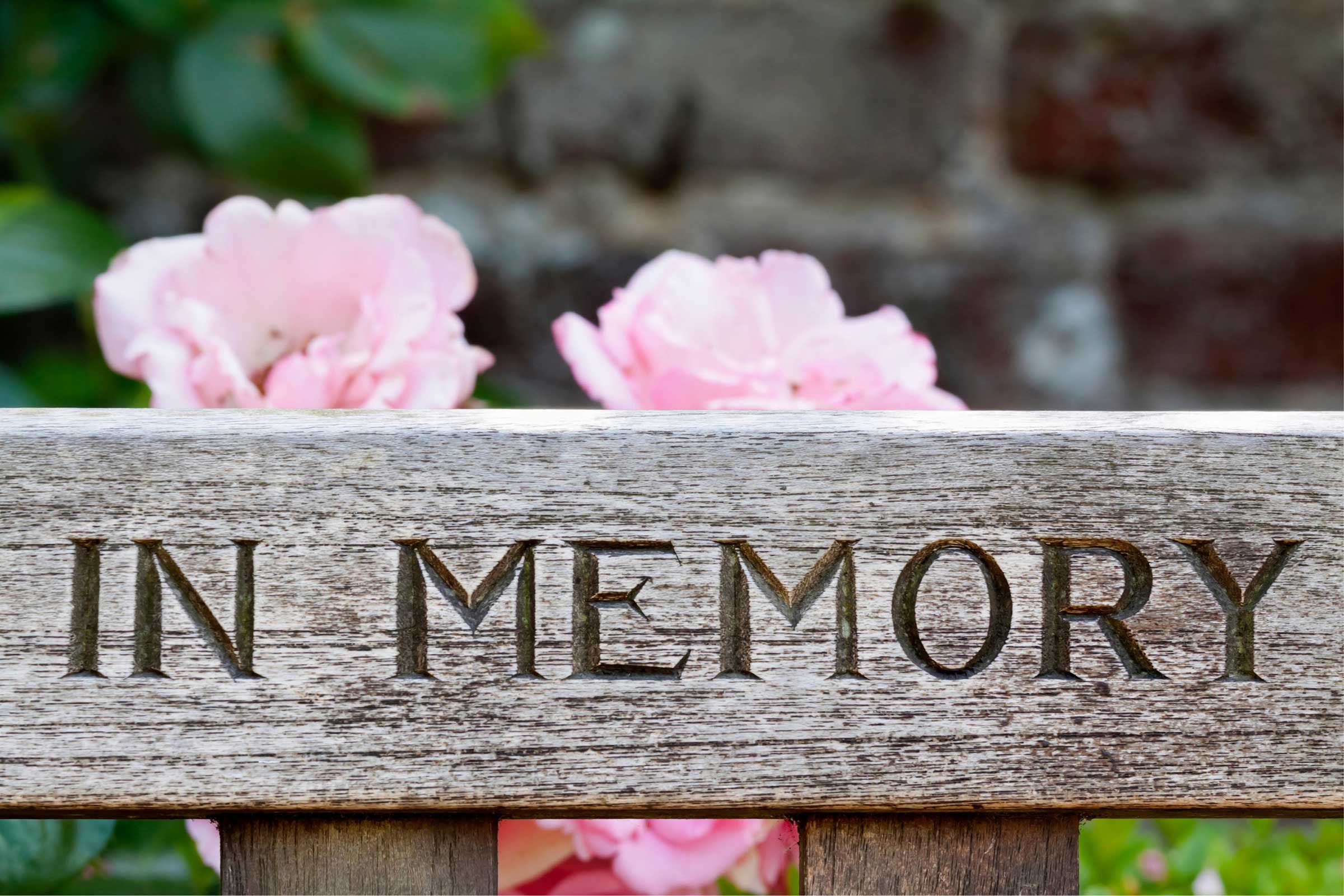 Close up of bench with the words 'In Memory' engraved in it