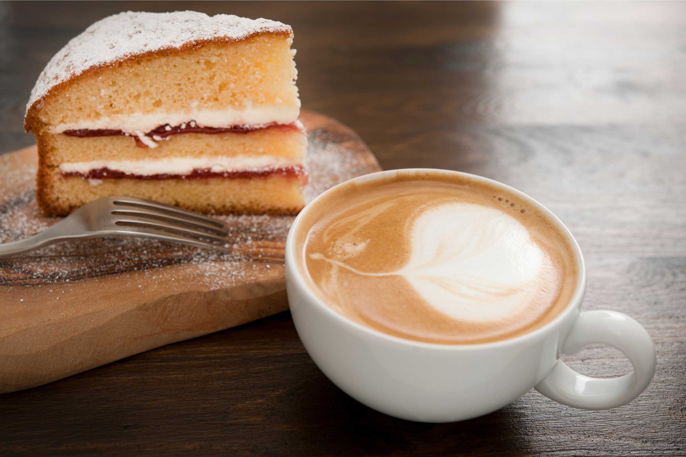 Piece of cake with a cup of coffee