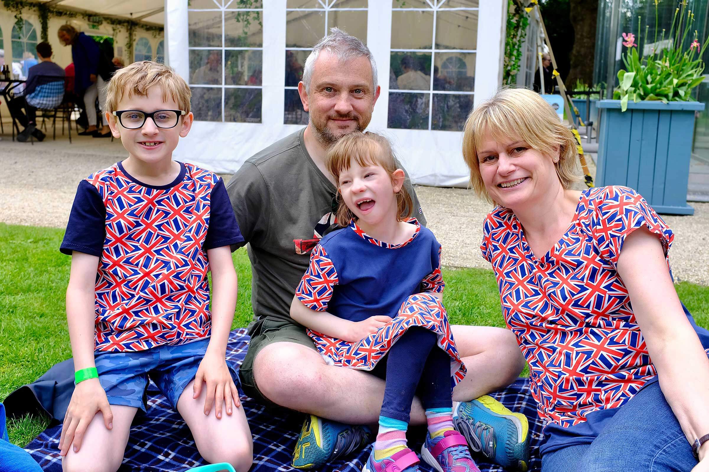 Family with Jubilee tops on at a Jubilee party