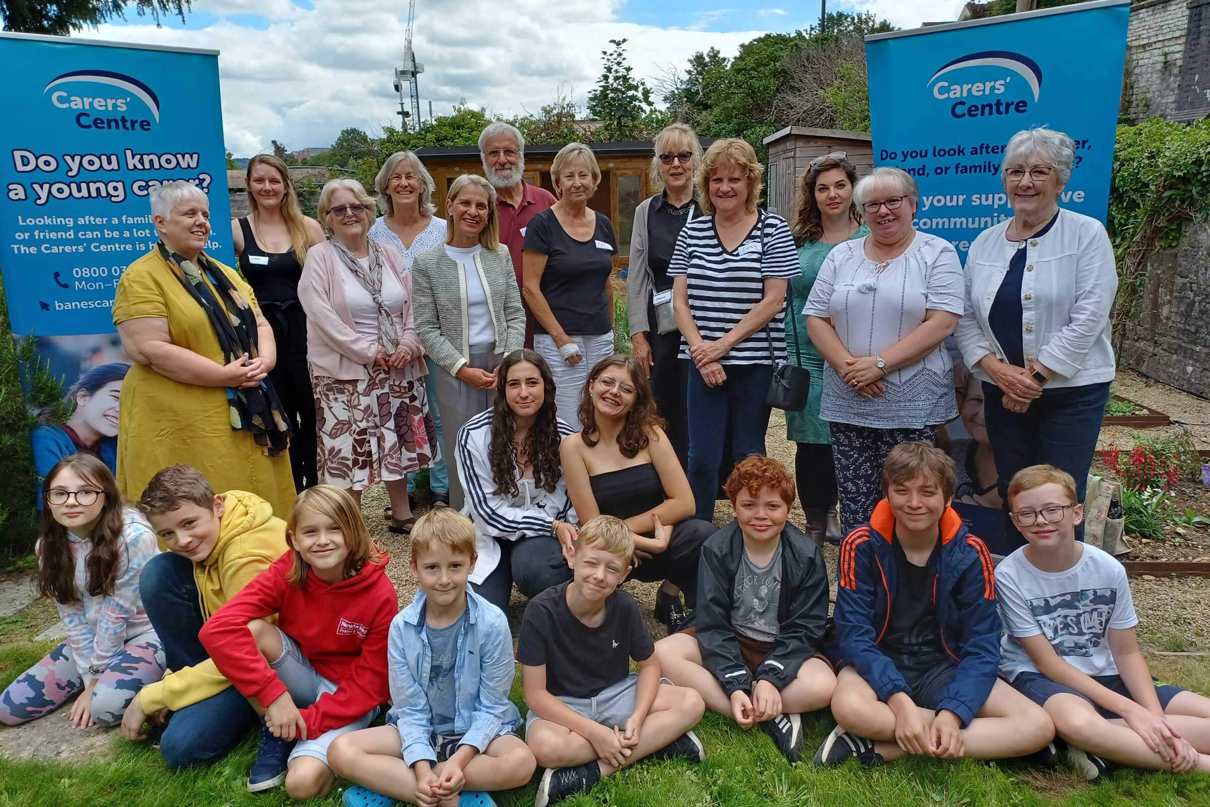 Volunteers and young carers in a group photo