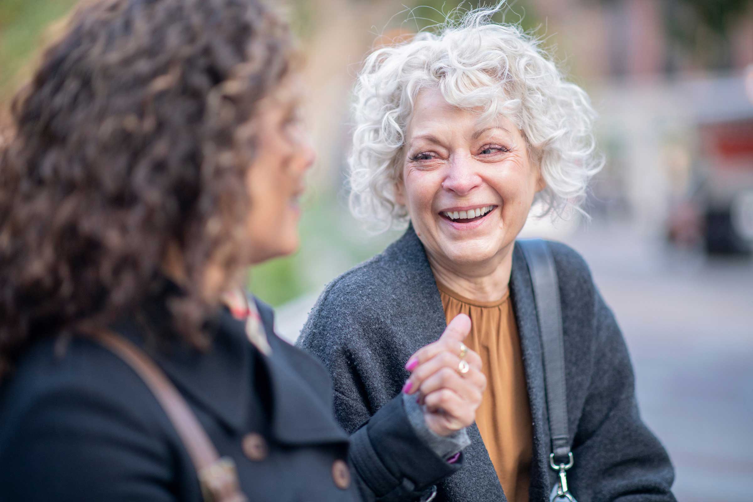 Women looking at someone laughing
