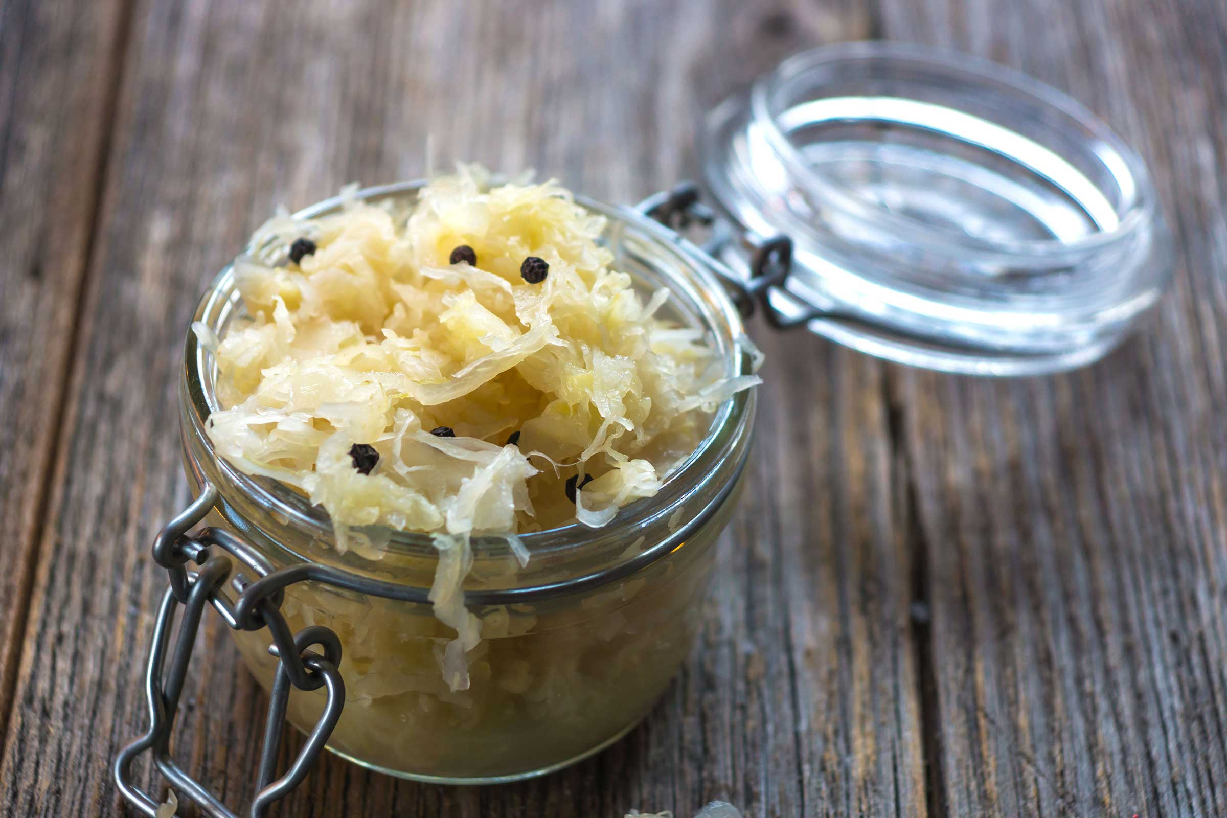 Jar of fermented food with the lid open