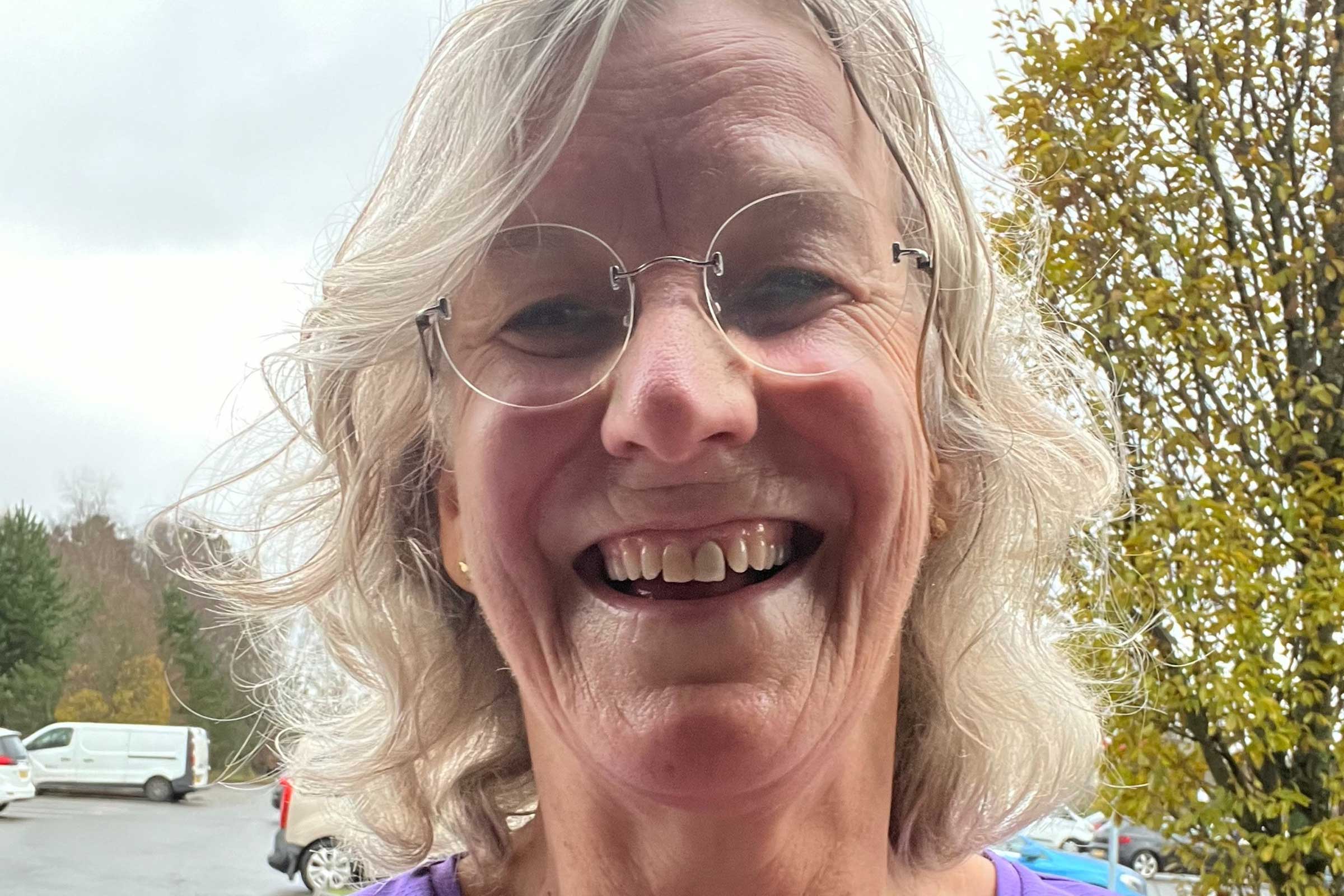 Close up of a woman smiling at the camera