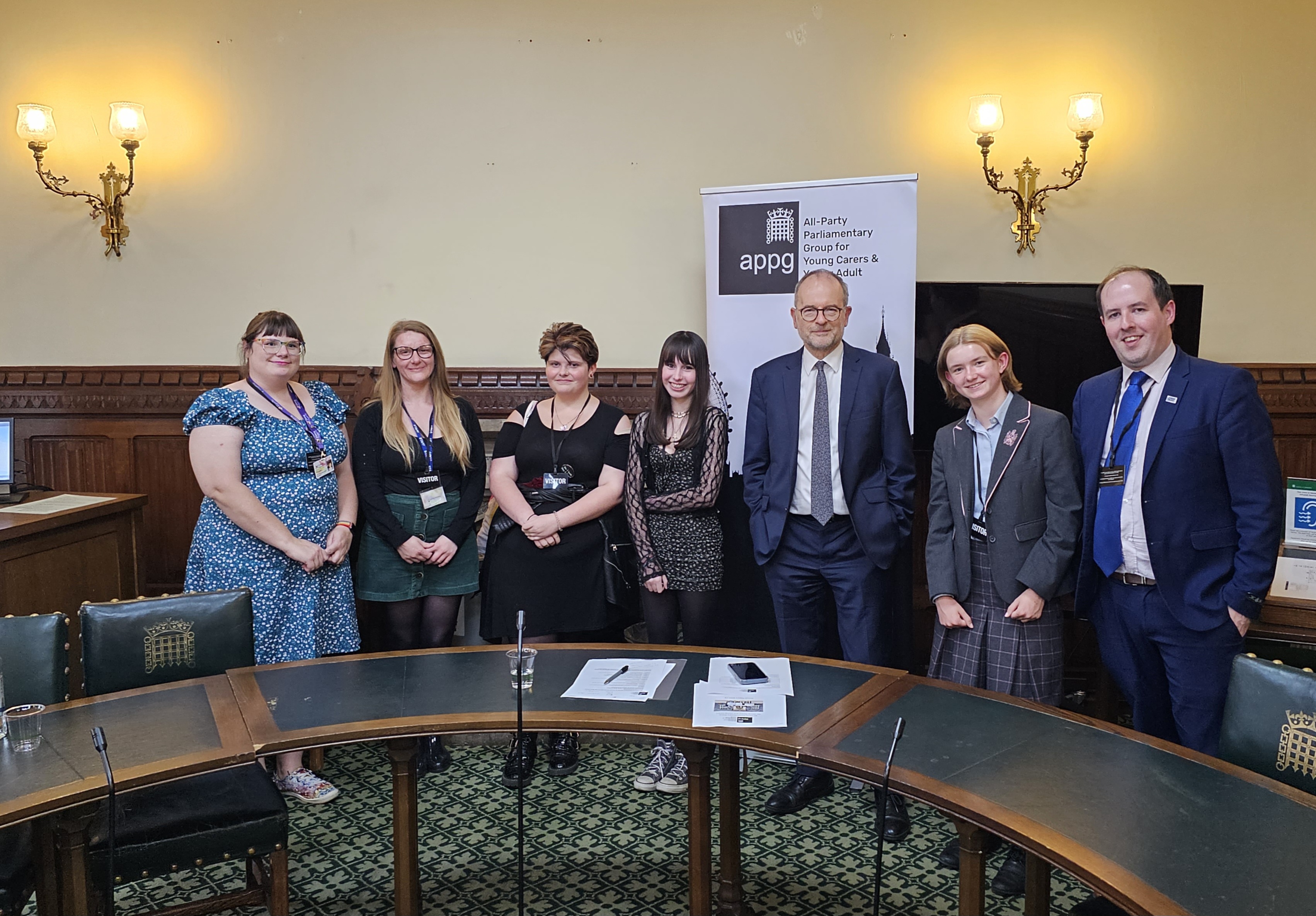 Young carers at the House of Commons alongside MP Paul Blomfield and Andy McGowan, Carers Trust.