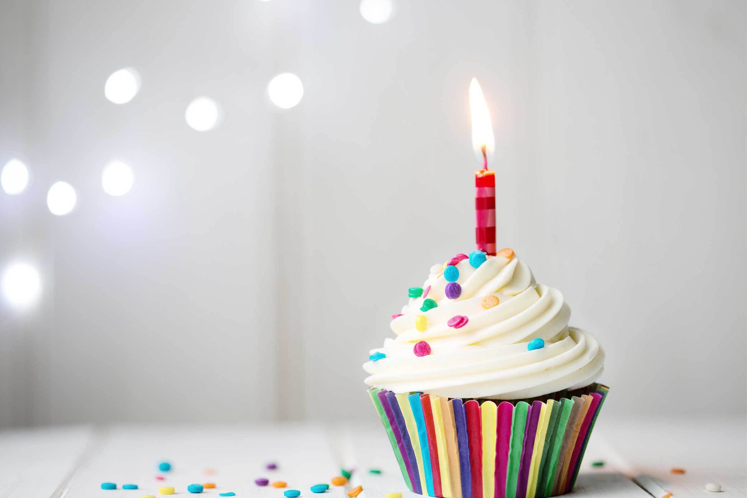 Cup cake with a candle in it